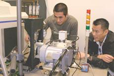 students working on Macromolecular diffractometer